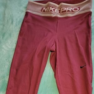 Nike Pro Dri Fit leggings , Size M, Color Burgundy.